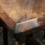 Detailed view of the river pattern created by the epoxy resin on the Sylva Home custom black walnut dining table, model ET9.