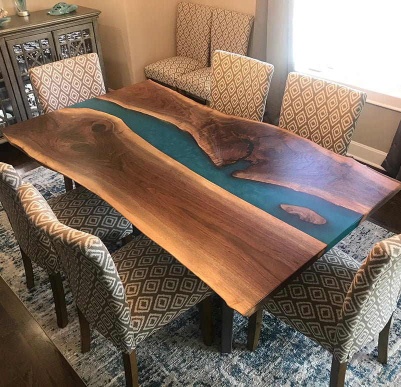 Top view of the Sylva Home custom black walnut epoxy resin blue river table, model ET11.