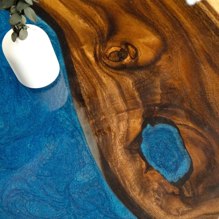 View of the river pattern created by the epoxy resin on the Sylva Home custom black walnut epoxy resin river table, model ET2.