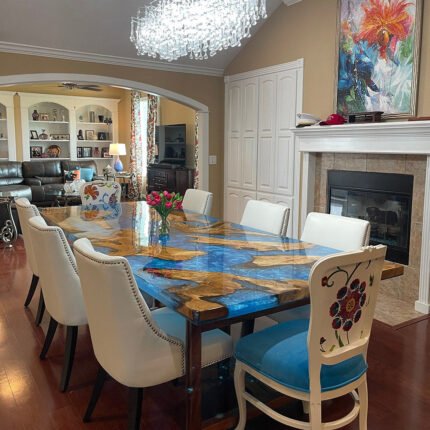 Side view of the Sylva Home custom Cunninghamia wood epoxy dining table, model ET53, showcasing the table's edge and legs.