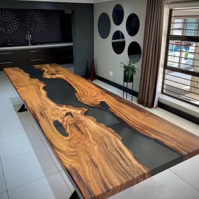 Side view of the Sylva Home custom epoxy resin river conference table, model ET18, showcasing the table's edge and design.