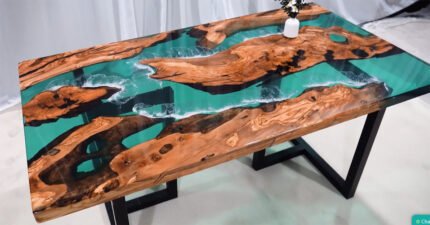 Full view of the Sylva Home custom epoxy resin river dining table, model ET47, highlighting its design and finish.