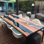 Top view of the Sylva Home custom epoxy table tops with black walnut, model ET21.