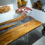 Side view of the Sylva Home custom ice crack epoxy resin dining table, model ET26, showcasing the table's edge and legs.