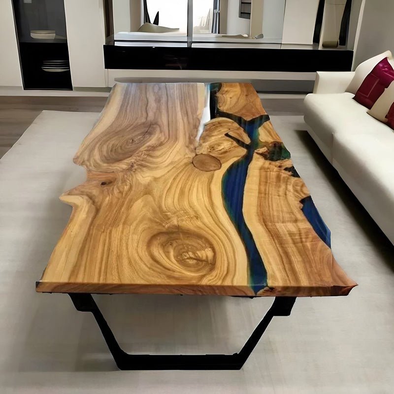 Side view of the Sylva Home custom live edge epoxy river table, model ET52, showcasing the table's edge and legs.