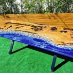 Full view of the Sylva Home custom ocean epoxy resin dining table, model ET3, highlighting its overall design and finish.