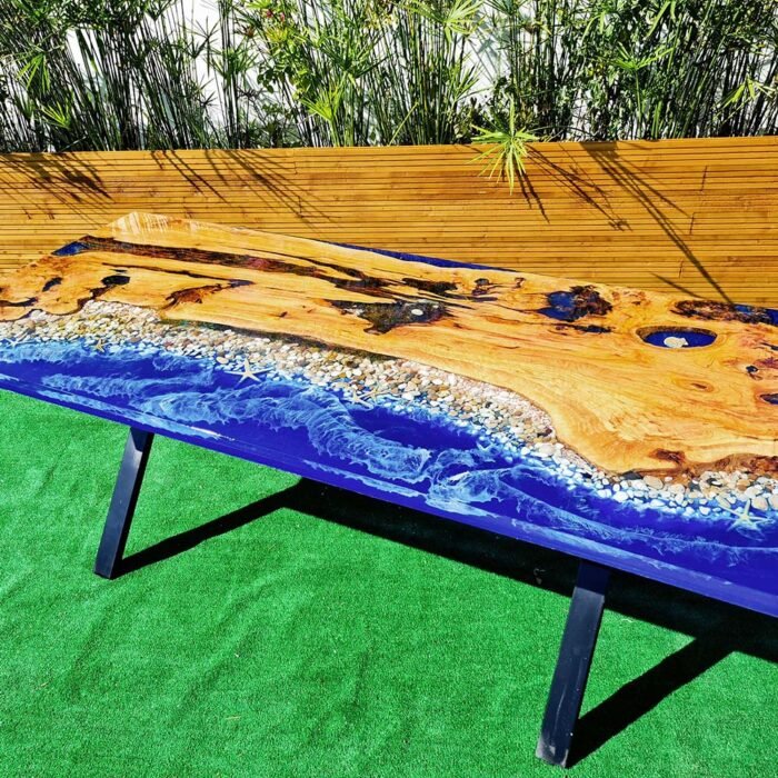 Full view of the Sylva Home custom ocean epoxy resin dining table, model ET3, highlighting its overall design and finish.