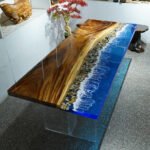 Top view of the Sylva Home custom ocean wave walnut epoxy dining table, model ET24.