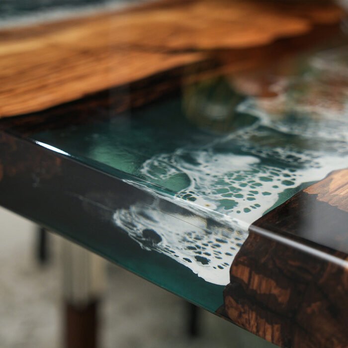 Close-up view of the epoxy resin detail on the Sylva Home custom olive green wave epoxy table, model ET5.