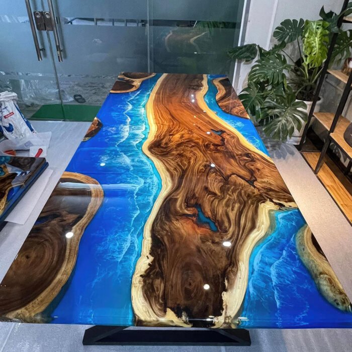 Top view of the Sylva Home custom walnut epoxy ocean table, model ET37.