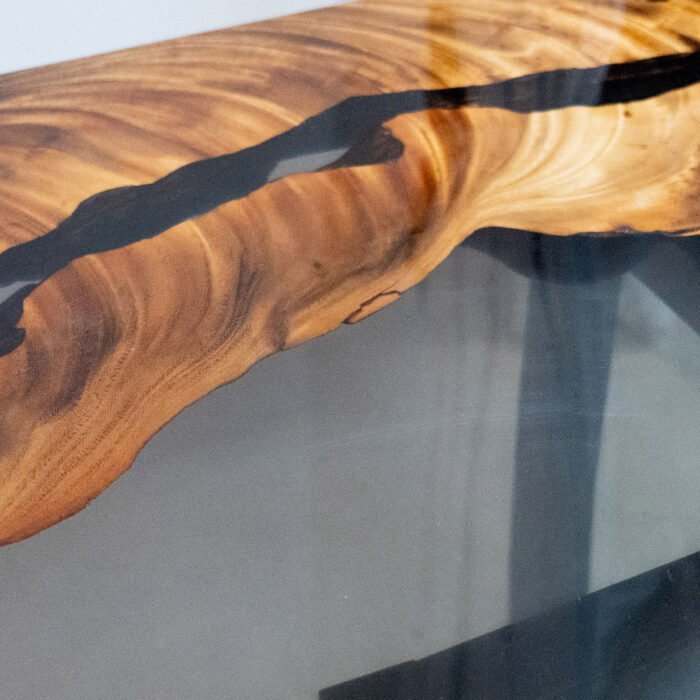 Close-up of the surface finish on the Sylva Home custom walnut epoxy resin river table, model ET1.