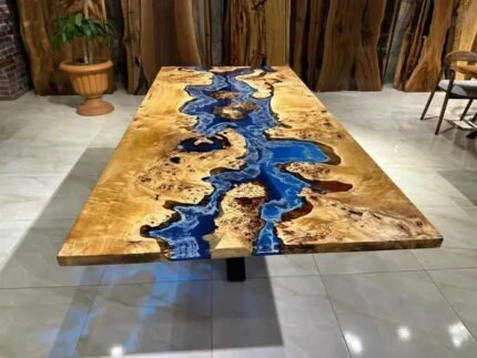 Side view of the Sylva Home custom walnut epoxy resin river table, model ET20, showcasing the table's edge and structure.