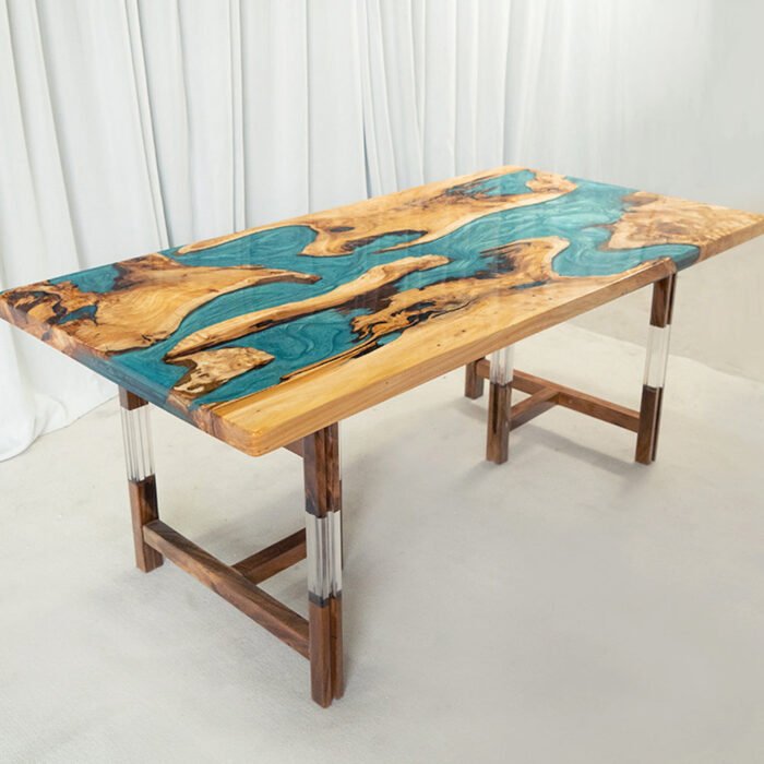 Angled view of the Sylva Home custom walnut epoxy resin river tables, model ET6, showing the tables’ depth and texture.