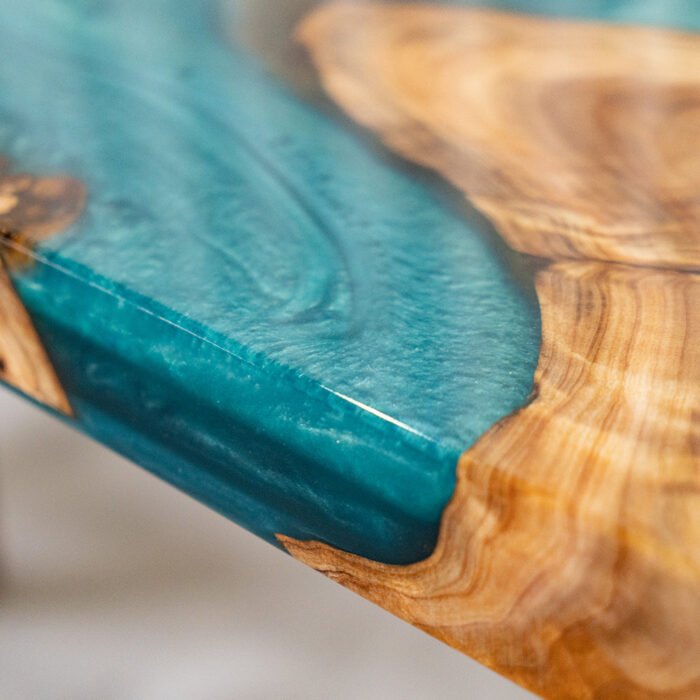 Detailed view of the river pattern created by the epoxy resin on the Sylva Home custom walnut tables, model ET6.