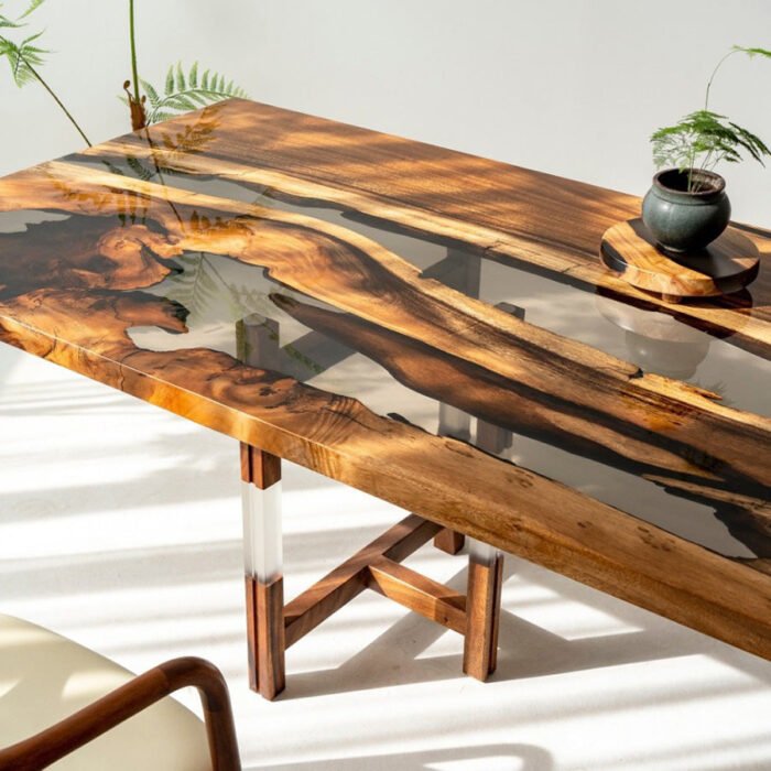 Angled view of the Sylva Home custom walnut epoxy river slab dining table, model ET17, showing its depth and texture.