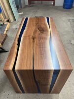 Full view of the Sylva Home custom epoxy resin waterfall river table, model ET66, highlighting its design and finish.