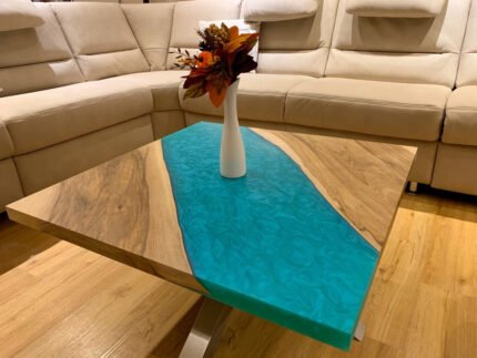 Side view of the Sylva Home custom epoxy square table for living room, model ET58, showcasing the table's edge and legs.