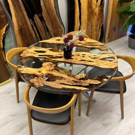 Angled view of the Sylva Home custom olive wood epoxy coffee table, model ET68, showcasing its overall aesthetic.