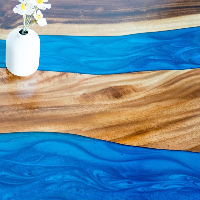 View of the river pattern created by the epoxy resin on the Sylva Home custom round epoxy coffee table, model ET69.