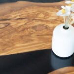 Close-up of the table surface finish on the Sylva Home custom round epoxy coffee table, model ET69.