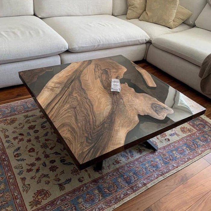 Side view of the Sylva Home custom square resin coffee table, model ET57, showcasing the table's edge and legs.